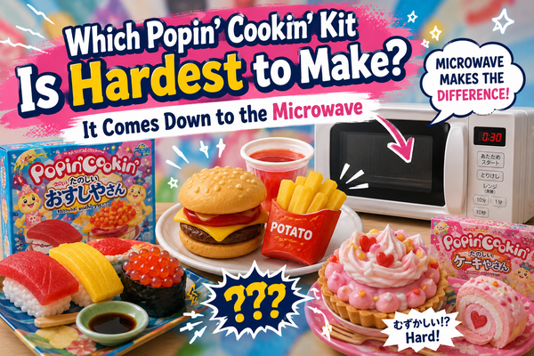 Popin' Cookin' difficulty theme: a sushi kit box and a cake kit box beside a realistic candy hamburger and fries, next to a microwave, illustrating that heating in the microwave is what makes a DIY candy kit hard to make.